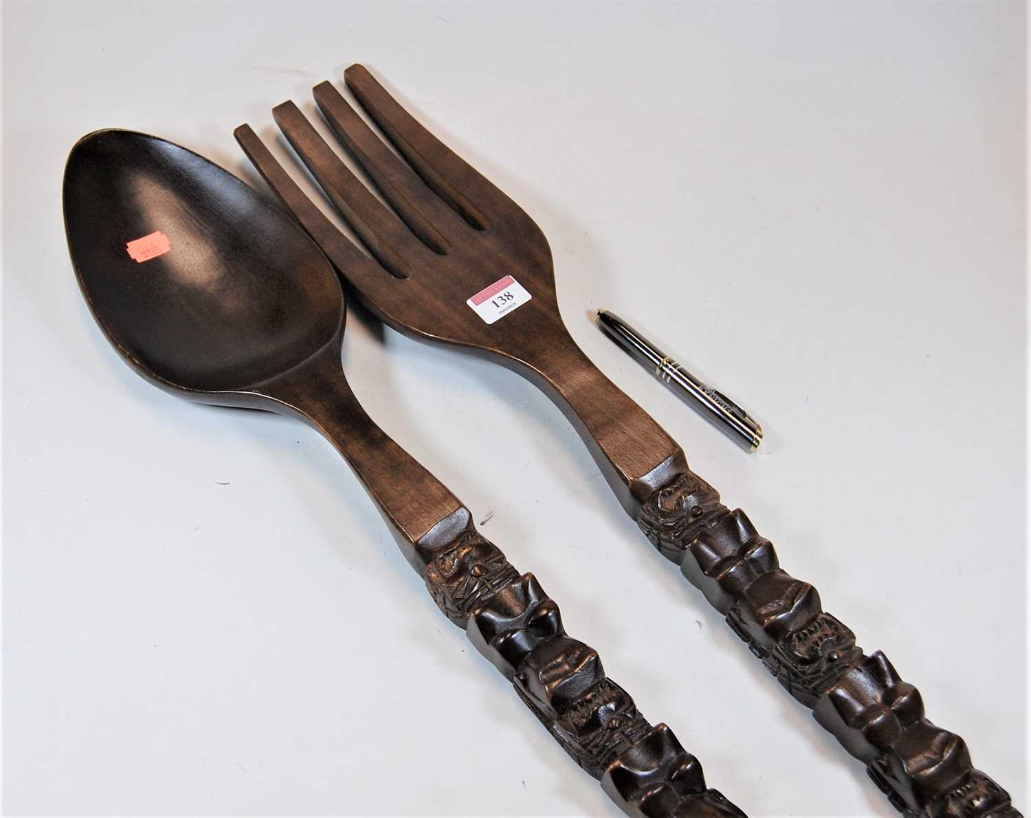 Lot 138 - A novelty carved beech over sized fork and...