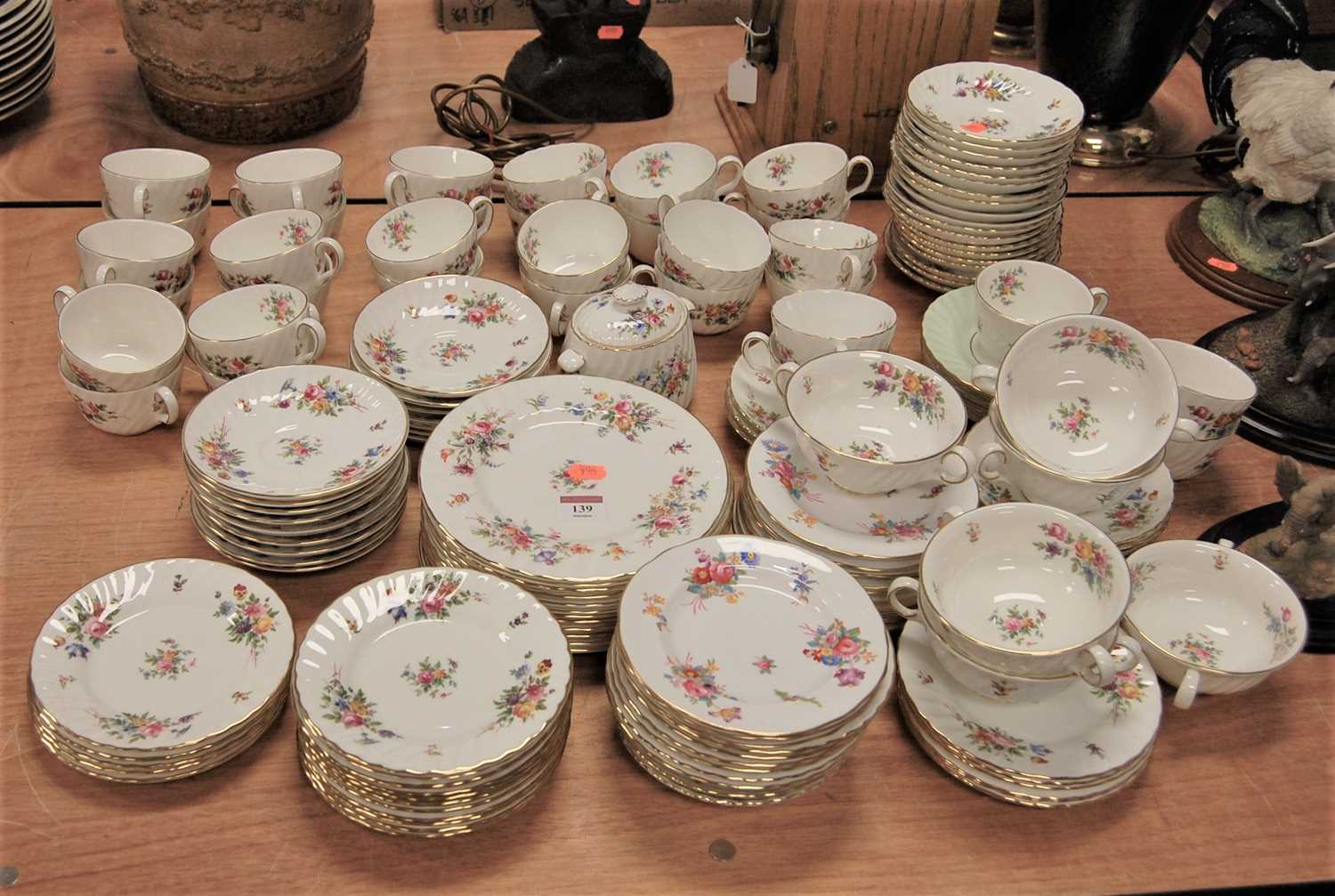 Lot 139 - An extensive Mintons 12-place setting tea and...