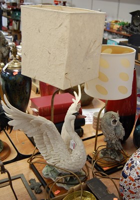 Lot 144 - A modern table lamp surmounted by a resin owl...