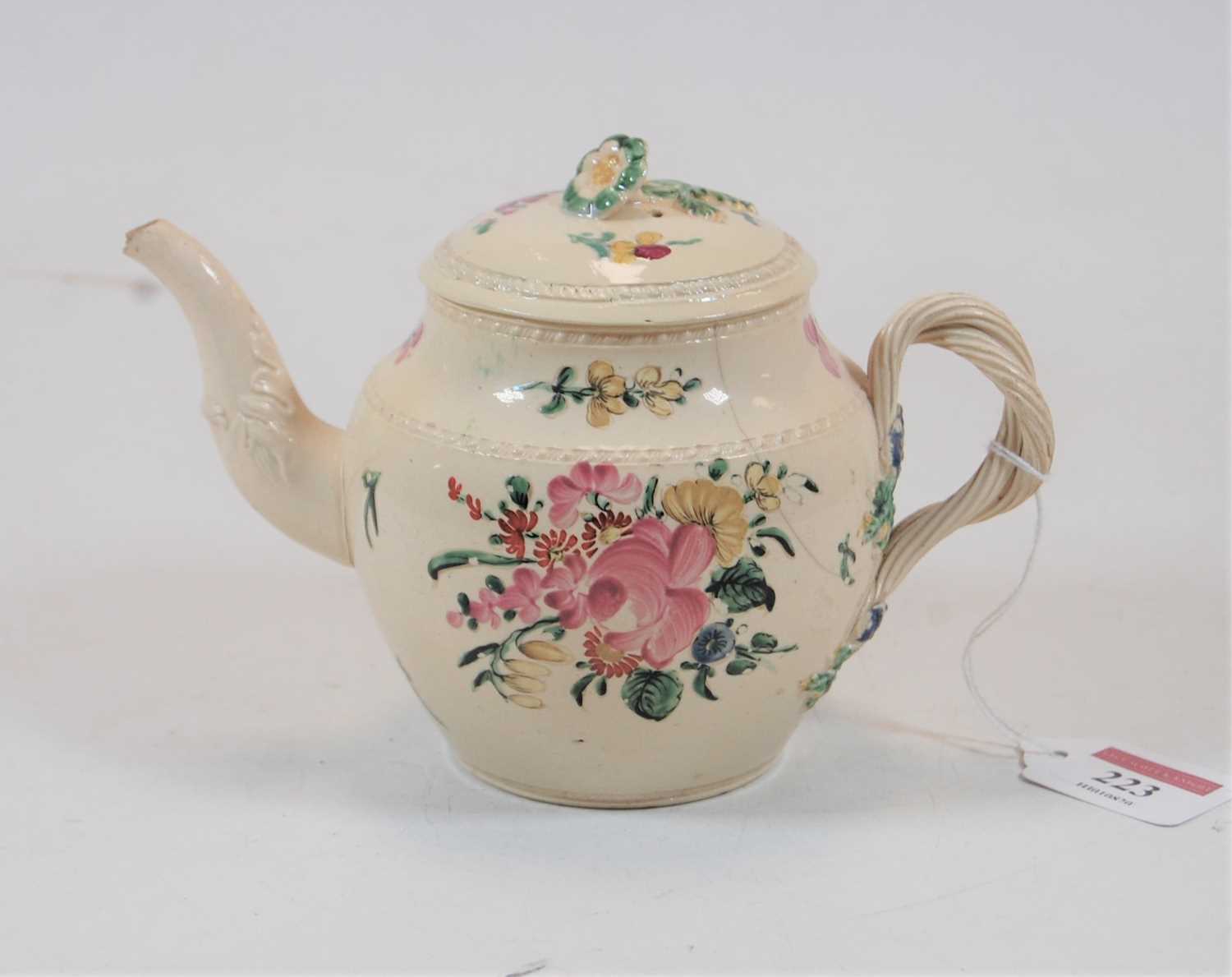 Lot 223 - A late 18th century Leeds creamware teapot,...