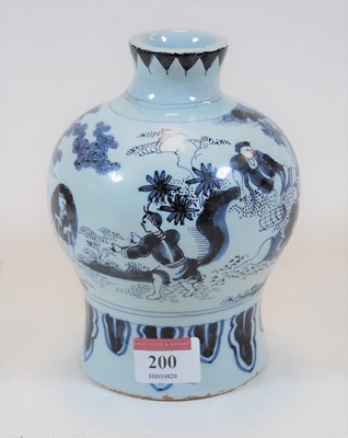 Lot 200 - An 18th century Dutch Delft bottle vase...