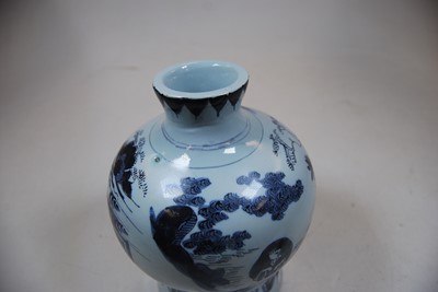 Lot 200 - An 18th century Dutch Delft bottle vase...