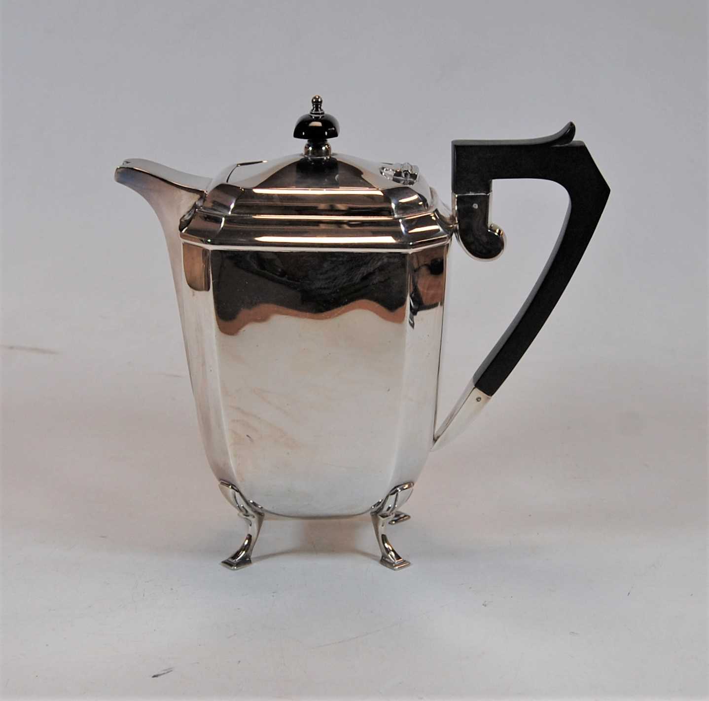 Lot 235 - An Art Deco silver plated coffee pot, h.19cm