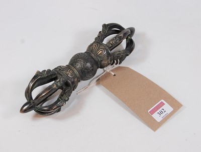 Lot 302 - A 20th century South-East Asian bronzed metal...
