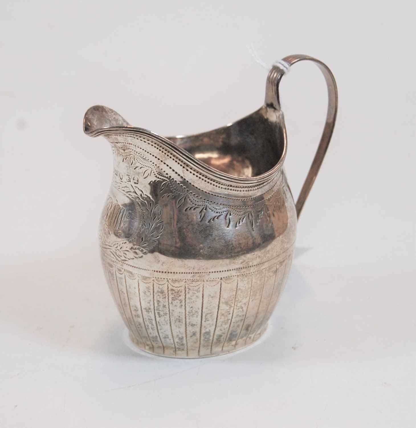 Lot 236 - A George III silver cream jug having bright...