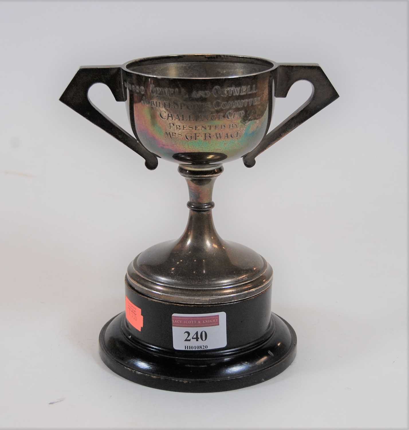Lot 240 - A George V silver twin handled pedestal trophy...