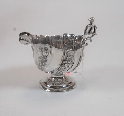 Lot 248 - A late Victorian silver and embossed footed...