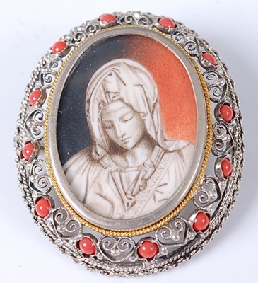 Lot 325 - A continental white metal and coral set...