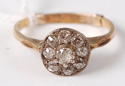 Lot 353 - A mid century 18ct gold diamond cluster ring,...