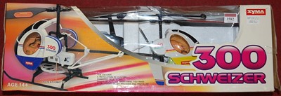 Lot 1582 - A Schweizer 300 radio controlled helicopter,...