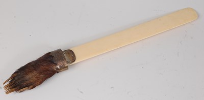 Lot 696 - * A late Victorian ivory page turner, mounted...