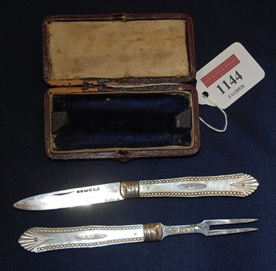 Lot 1144 - A cased pair of mid-Victorian silver and...