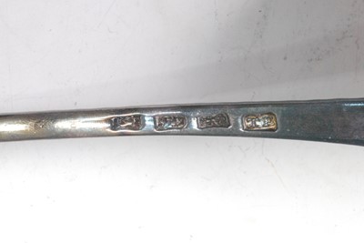 Lot 1148 - An early George III silver soup ladle, having...