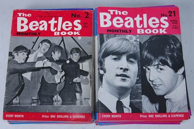 Lot 658 - A collection of Beatles memorabilia to include