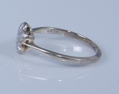 Lot 1208 - A white metal diamond circular cluster ring,...