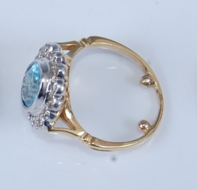 Lot 1229 - A yellow and white metal, aquamarine and...