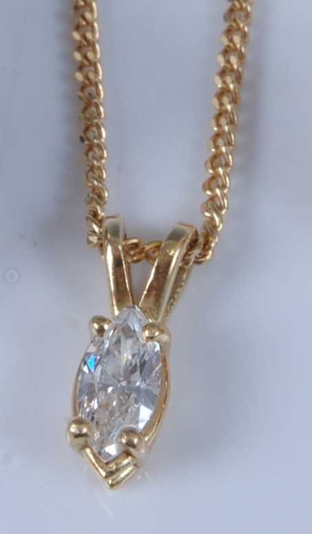 Lot 1266 - An 18ct yellow gold single stone marquise cut...