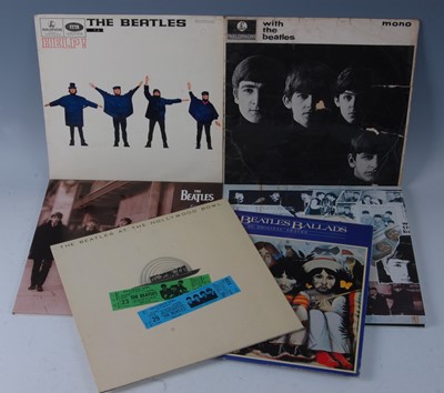 Lot 749 - The Beatles, a collection of six LP's to...