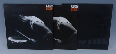 Lot 549 - U2, a collection of eight 12" singles to...