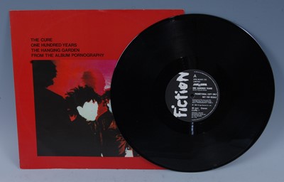 Lot 538 - The Cure, a collection of nine 12" singles to...