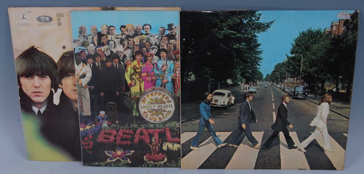 Lot 545 - The Beatles, a collection of three LP's to...