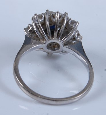 Lot 1250 - An 18ct white gold, sapphire and diamond...