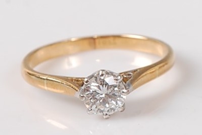 Lot 1252 - A yellow and white metal diamond solitaire...