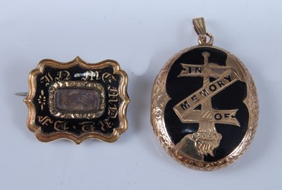 Lot 1254 - A yellow metal mourning brooch and locket, the...