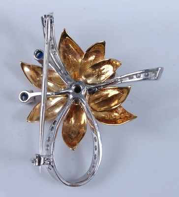 Lot 1255 - An 18ct yellow and white gold, sapphire and...