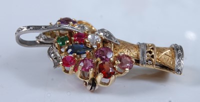 Lot 1256 - A yellow and white metal multi-stone brooch in...