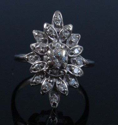 Lot 1259 - A white metal marquise shaped diamond cluster...