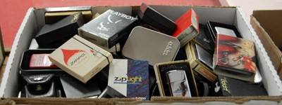 Lot 263 - A large collection of mainly boxed Zippo...