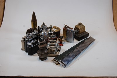 Lot 284 - A box of assorted cigarette lighters to...
