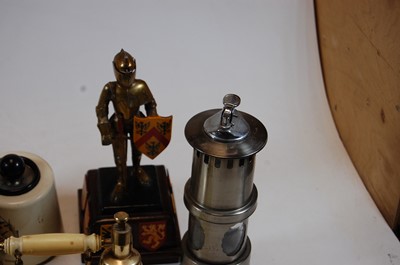 Lot 286 - A novelty table lighter in the form of a miner'...
