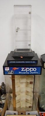 Lot 295 - A Zippo perspex lighter display case, height...