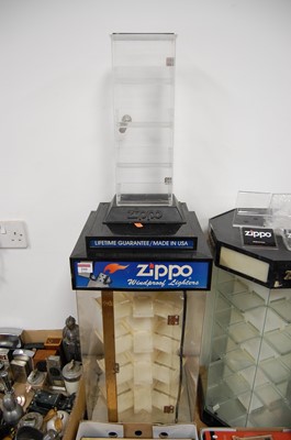 Lot 295 - A Zippo perspex lighter display case, height...