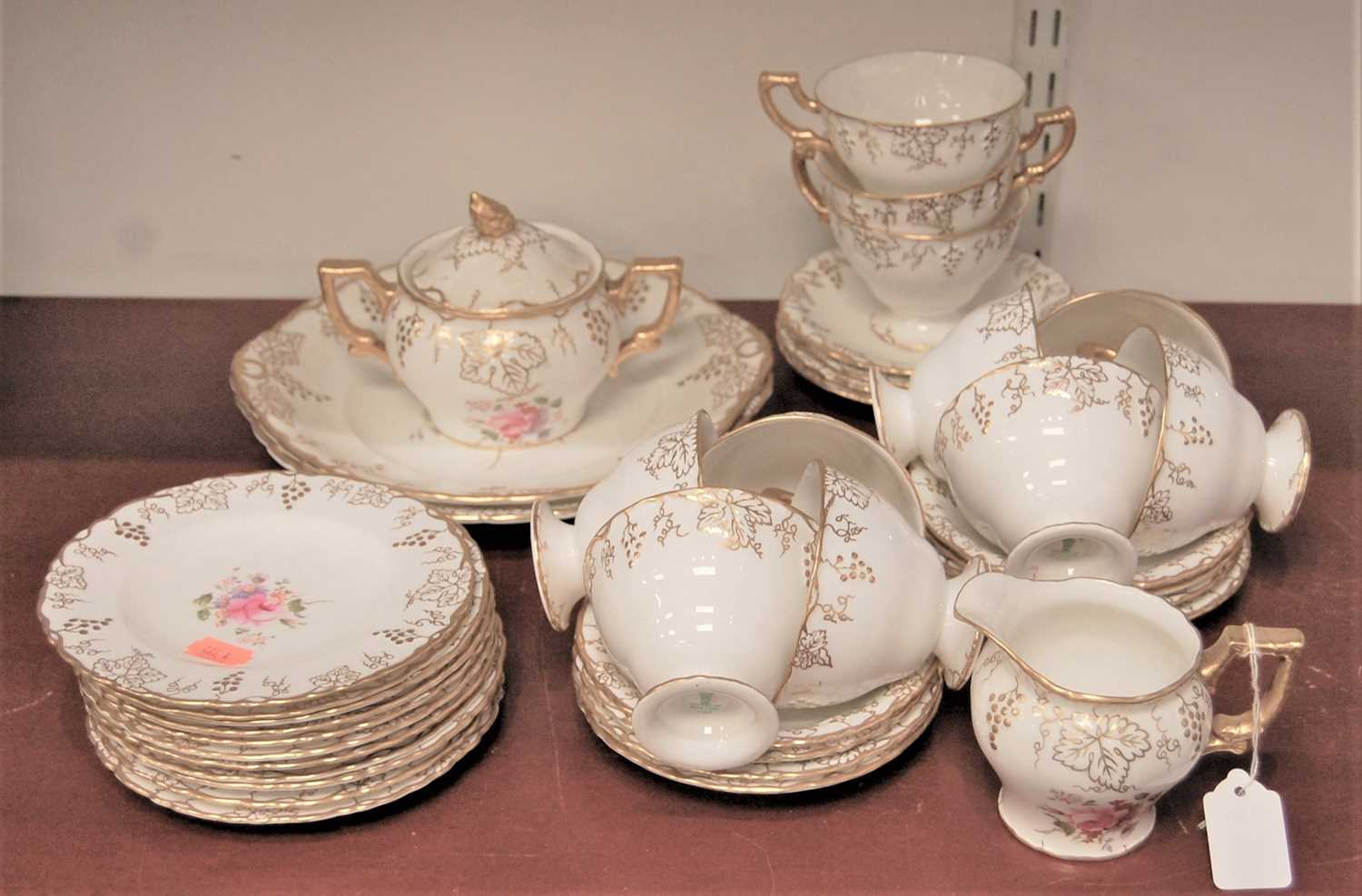 Lot 48 - A Royal Crown Derby bone china part teaset in...