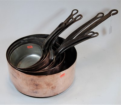 Lot 120 - Eight 19th century copper saucepans of varying...