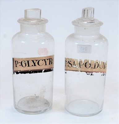 Lot 145 - Two 19th century glass apothecary jars and...