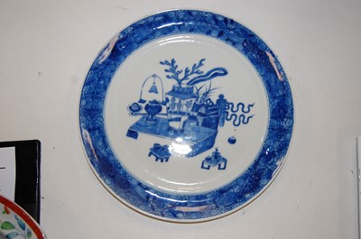 Lot 179 - A blue and white plate, in the Chinese style,...