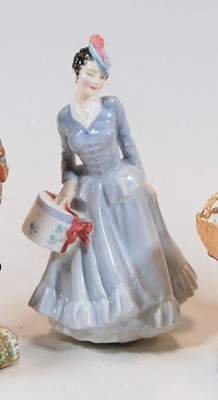 Lot 184 - A Royal Doulton figurine 'Midinette' HN 2090