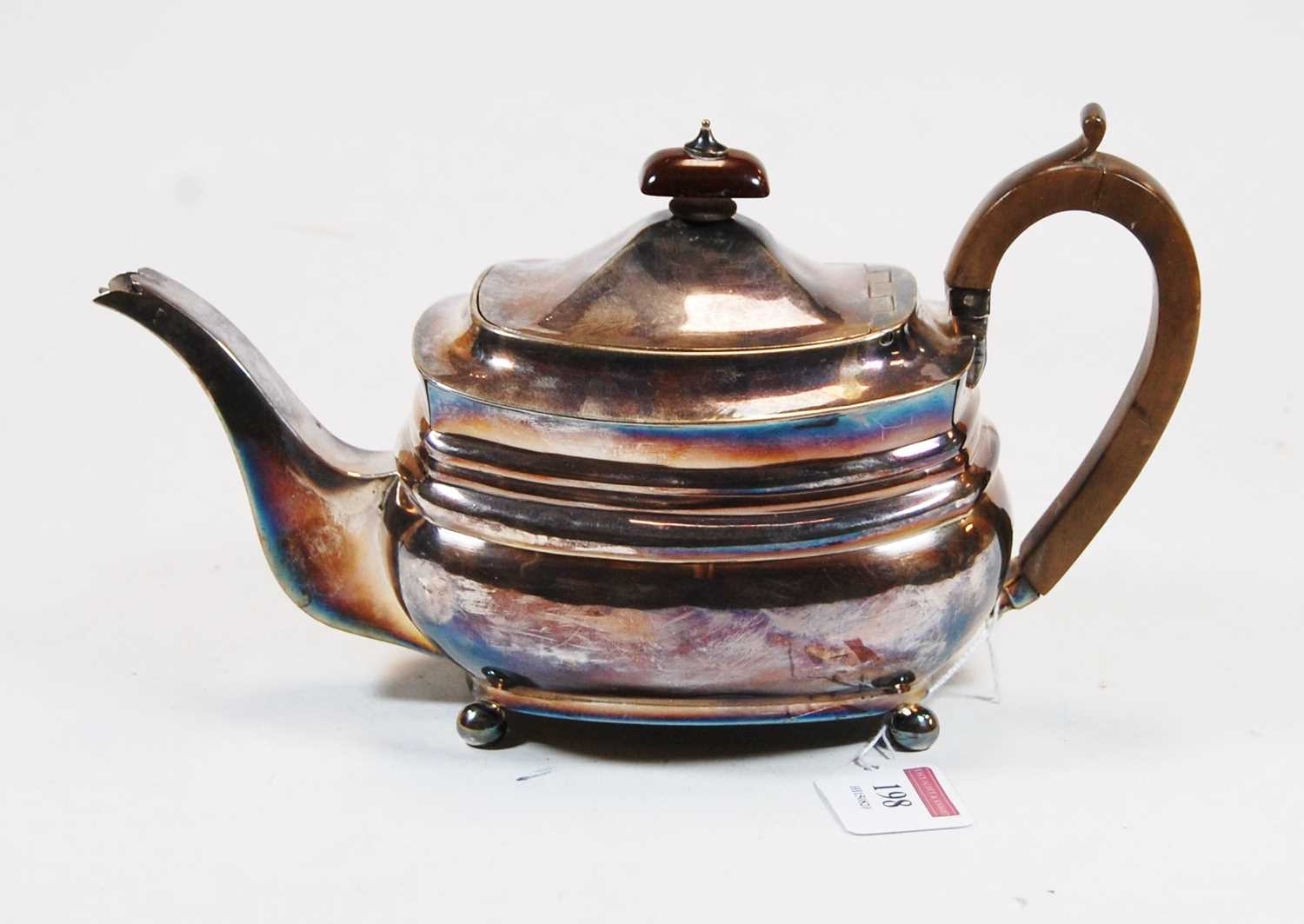 Lot 198 - A 19th century silver teapot, of squat oval...
