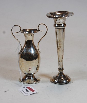 Lot 199 - A small George V silver twin handled vase, on...