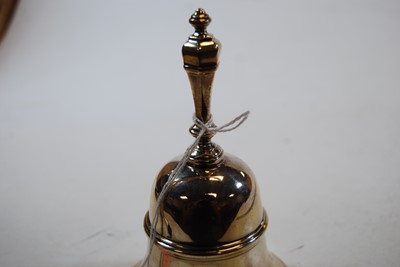 Lot 205 - A George V silver table bell, of typical form,...