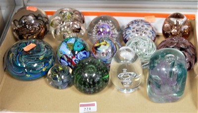 Lot 221 - A collection of assorted glass paperweights,...