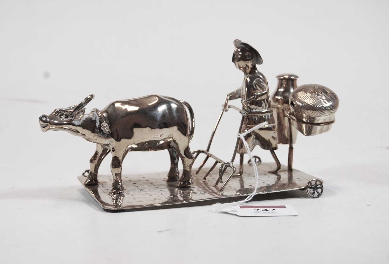 Lot 242 - A Chinese white metal novelty cruet, in the...