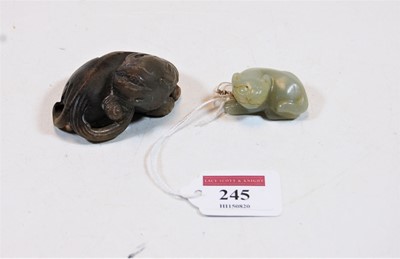 Lot 245 - A small polished hardstone carving in the form...