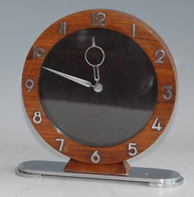 Lot 121 - An Art Deco walnut and chrome mantel clock ,...