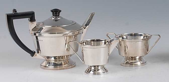 Lot 81 - An Art Deco silver bachelors three-piece tea...