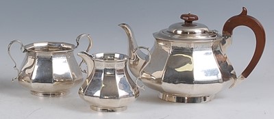 Lot 82 - An Art Deco silver three-piece tea set,...
